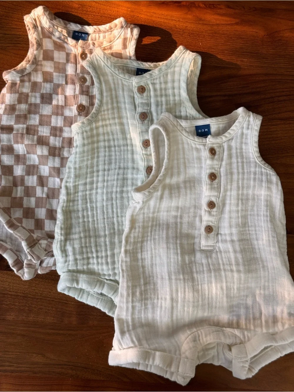 Old Navy Muslin Baby Rompers in Cream, Light Green Stripes, and Taupe Checkers